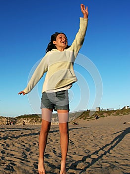 Happy girl on the beach