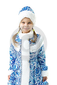 Happy girl in blue dress decorated with snowflakes