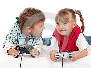 Happy girl and boy playing a video game