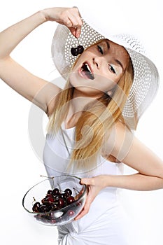 Happy girl with cherry