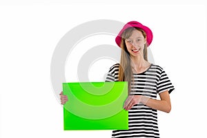 Happy girl child holding empty blank paper isolated on white background. copy space