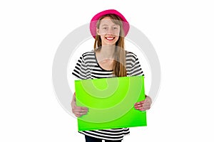 Happy girl child holding empty blank paper  on white background. copy space