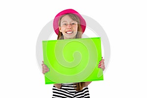 Happy girl child holding empty blank paper  on white background. copy space