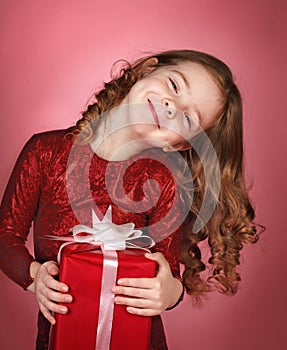 Happy girl with christmas gift box