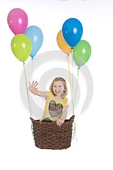 Happy girl with colorful balloons