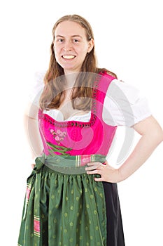 Happy girl in dirndl smiling to you