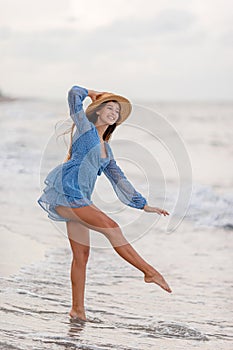 Happy girl enjoy summer vacation on the beach