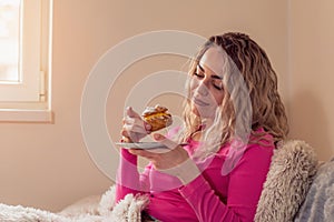 Happy girl enjoying in cookies