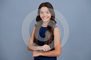 Happy girl face, positive and smiling emotions. Cute young teenager girl against a isolated background. Studio portrait