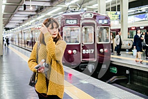 Happy girl fashion travel in kansai area in japan, first time in Osaka, cheerful emotions.