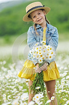 happy girl in the field with flowers