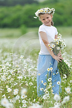 happy girl in the field with flowers