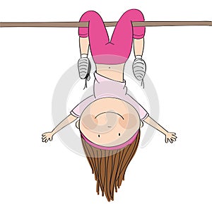 Happy girl hanging upside down on a horizontal bar or a monkey bar in the gym or on the playground, having fun - original hand