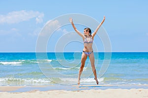 Happy Girl having fun on tropical beach