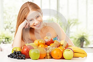 Happy girl and healthy vegetarian food, fruit