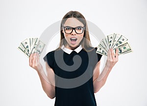 Happy girl holding dollar bills