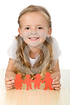 Happy girl holding paper people