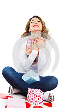 Happy girl holding valentine present