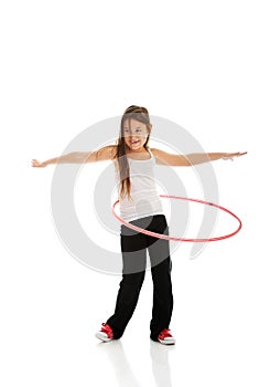 Happy girl with hula hoop