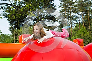 Happy Girl on Inflate Castle