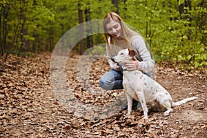 Happy girl interacting with her pet