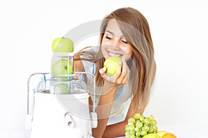 Happy girl about juicer photo