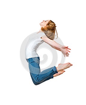Happy girl jumping isolated on white