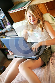 Happy girl with a laptop