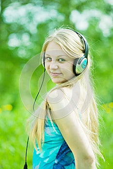 Happy girl listening music