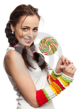 Happy girl with lollipop.