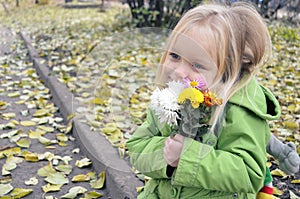 Happy girl in love with autumn