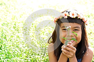 Happy girl on nature blur background.