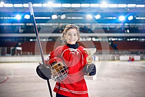 Happy girl player ice hockey winner trophy photo