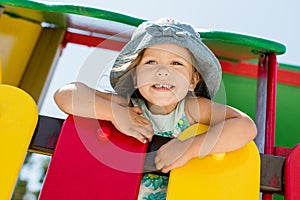 Happy girl on the playground