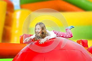 Happy Girl on the Playground Inflate Castle