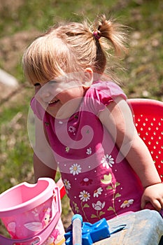 Happy girl playing outdoors