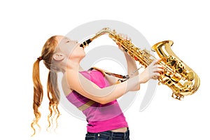 Happy girl playing saxophone on white background