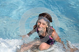 Happy girl in pool