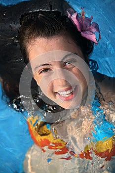 Happy girl in a pool