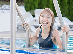 Happy girl in pool