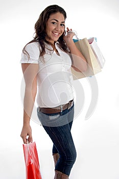 Happy girl posing with shopping bags