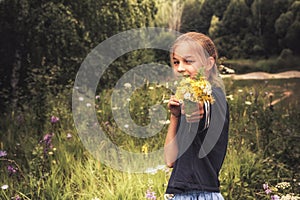 Happy girl present flower bouquet concept happy countryside childhood lifestyle