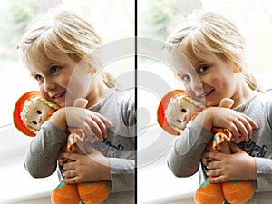 Happy girl with rag doll