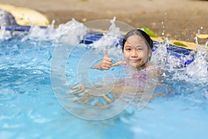 Happy girl relaxing enjoying hot tub bubble bath
