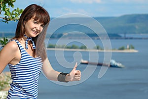 Happy girl in sailor's striped vest