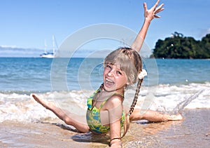 Happy girl at sea beach.