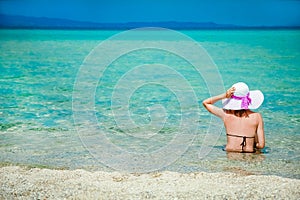 happy girl at sea in greece on sand nature