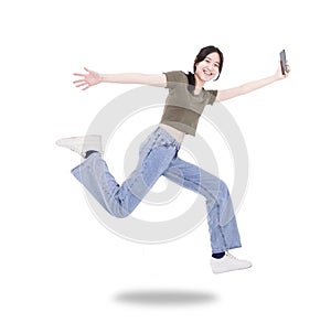 Happy girl student hold mobile phone jump and run wear t-shirt denim isolated white background