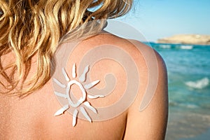 happy girl with the sun on her back by the sea in the nature