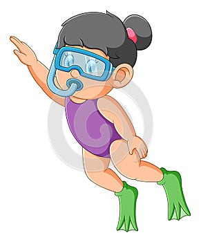 The happy girl is swimming and diving with the goggles
